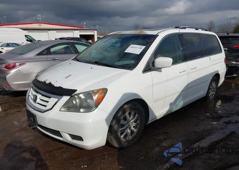 2010 Honda Odyssey Ex-L z USA, uszkodzony, nr VIN 5FNRL3H63AB103585